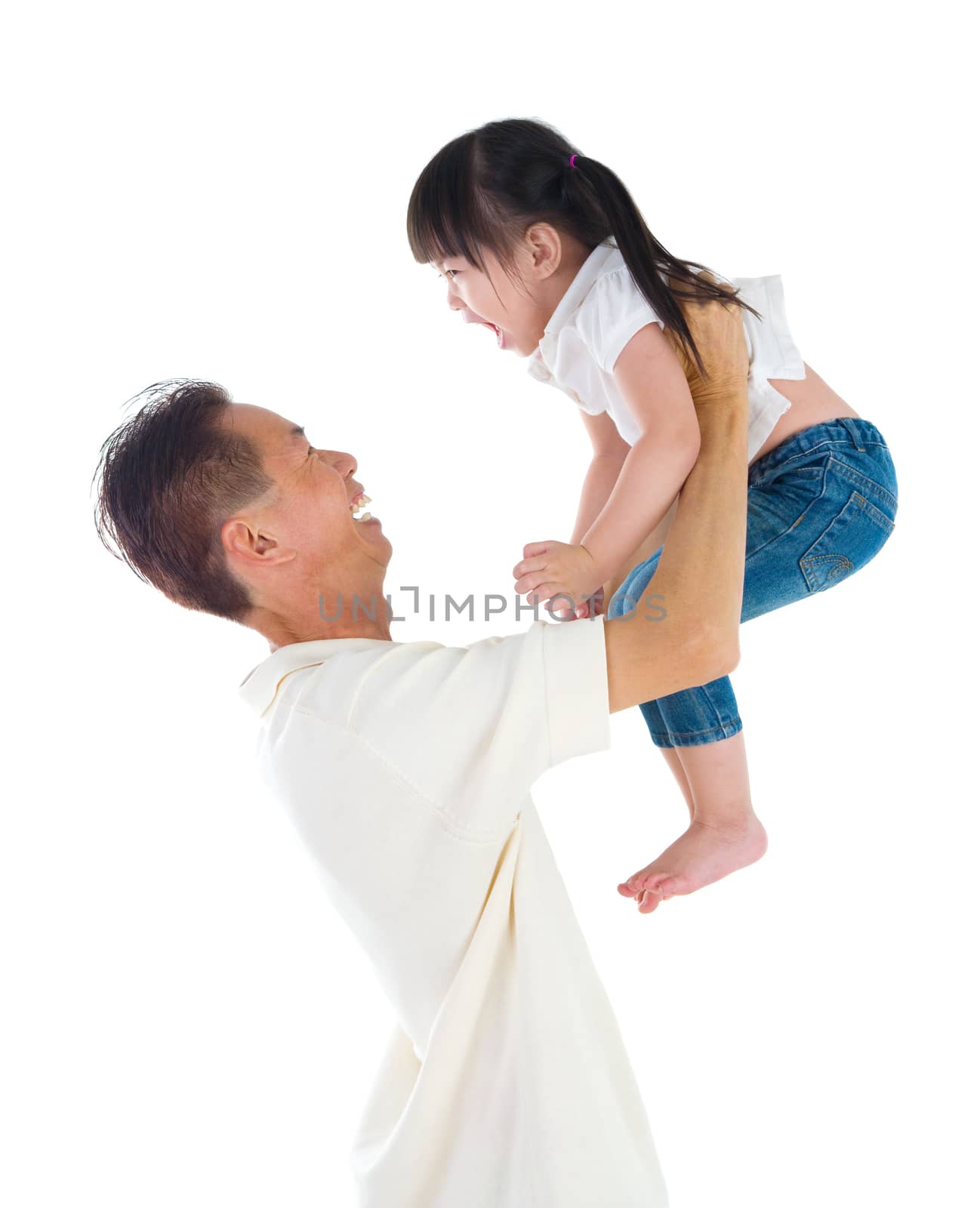 Happy asian man holding a smiling kid, isolated on white