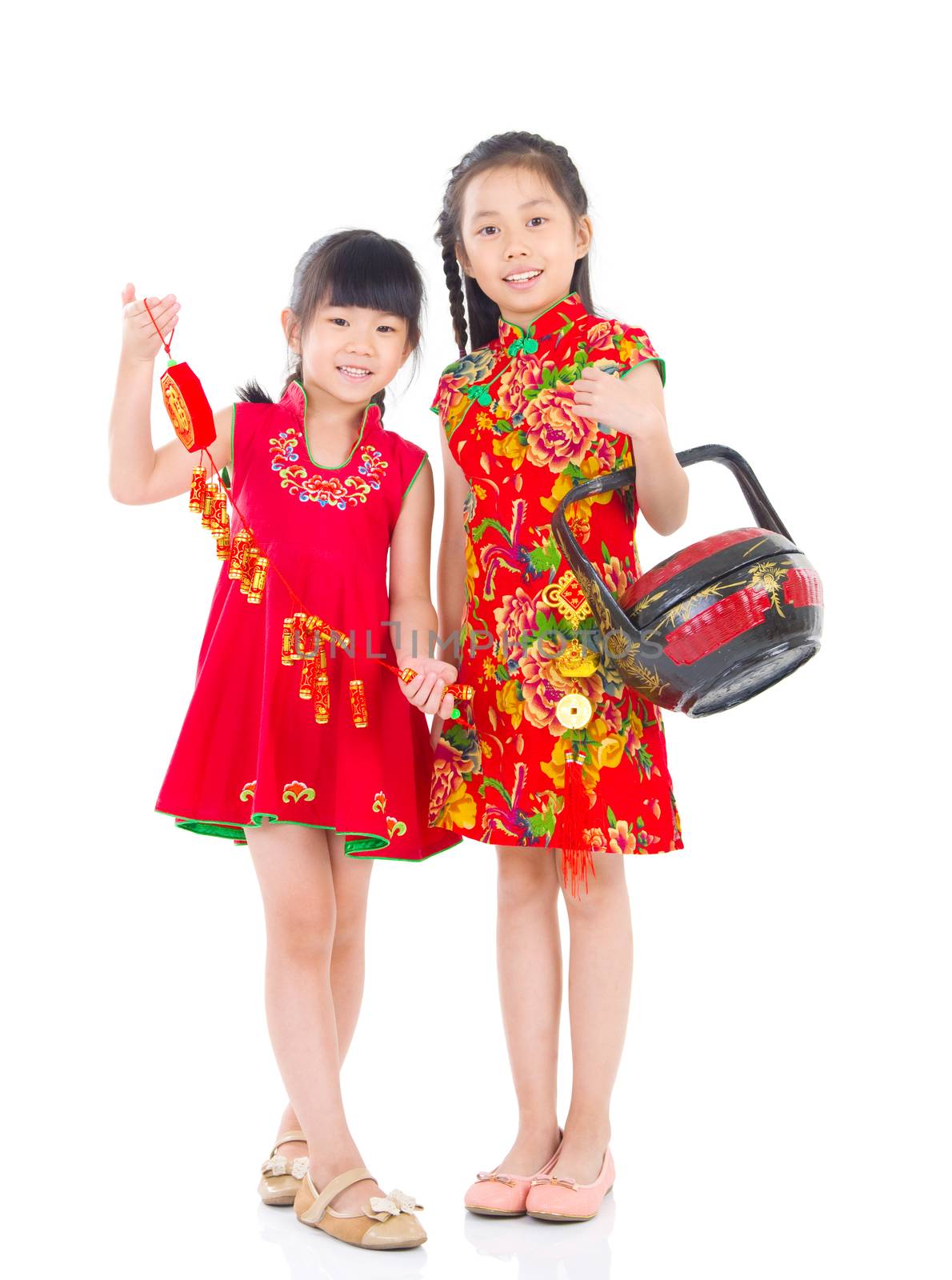  Asian Chinese girls decorating for Chinese new year