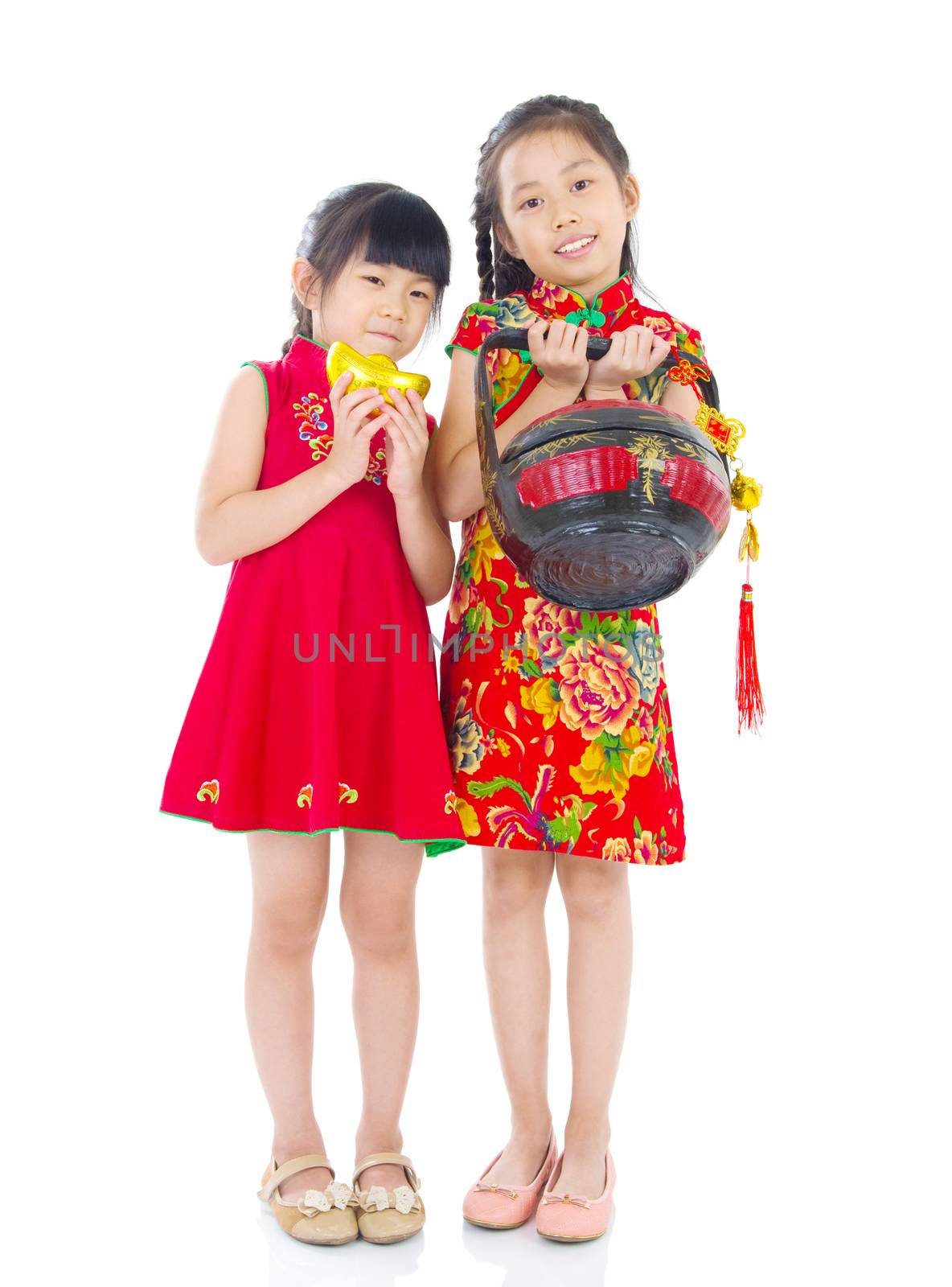  Asian Chinese girls decorating for Chinese new year