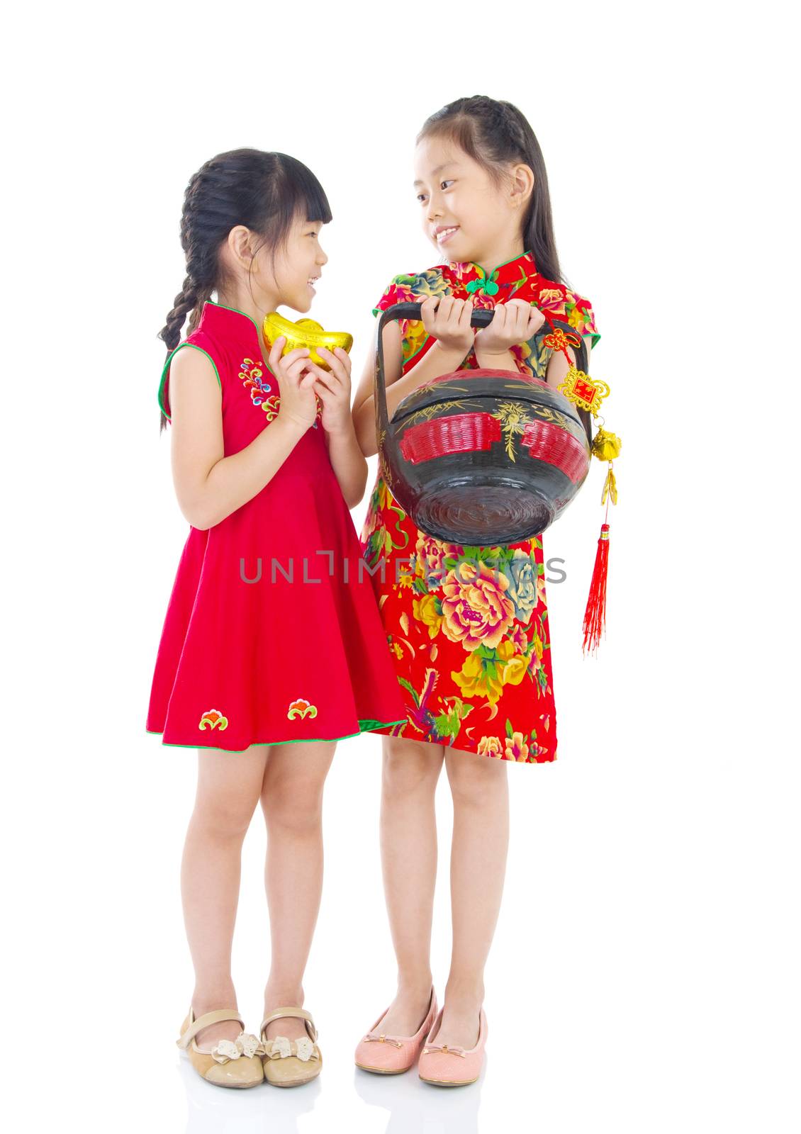  Asian Chinese girls decorating for Chinese new year