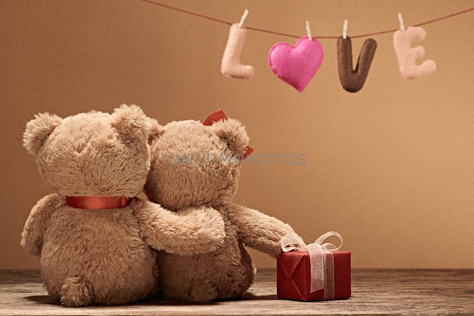 Valentines Day. Word Love heart. Couple Teddy Bears in embrace, hugging date. Handmade, gift. Vintage retro romantic. Unusual creative greeting card, wood. Family wedding friendship. Film grain effect