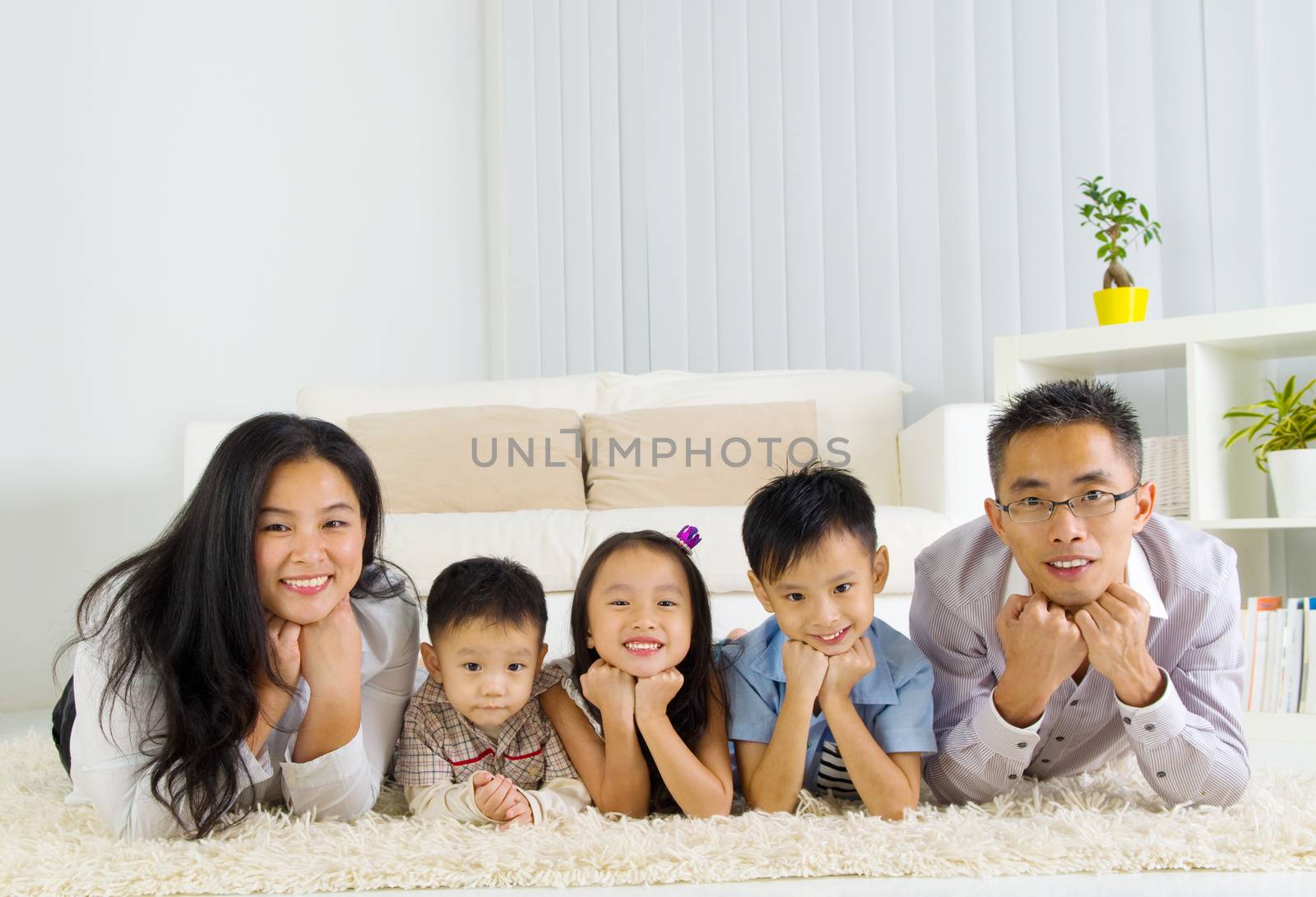 Indoor portrait of asian family