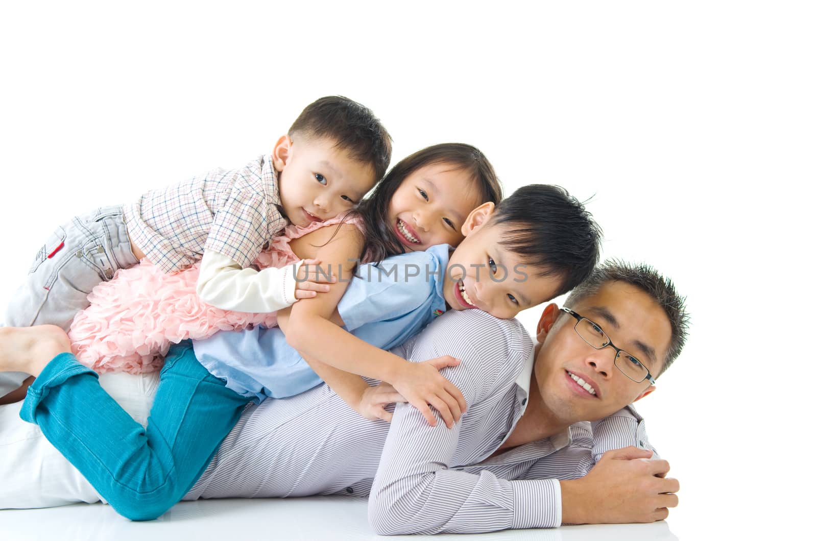 Asian family having piggyback fun