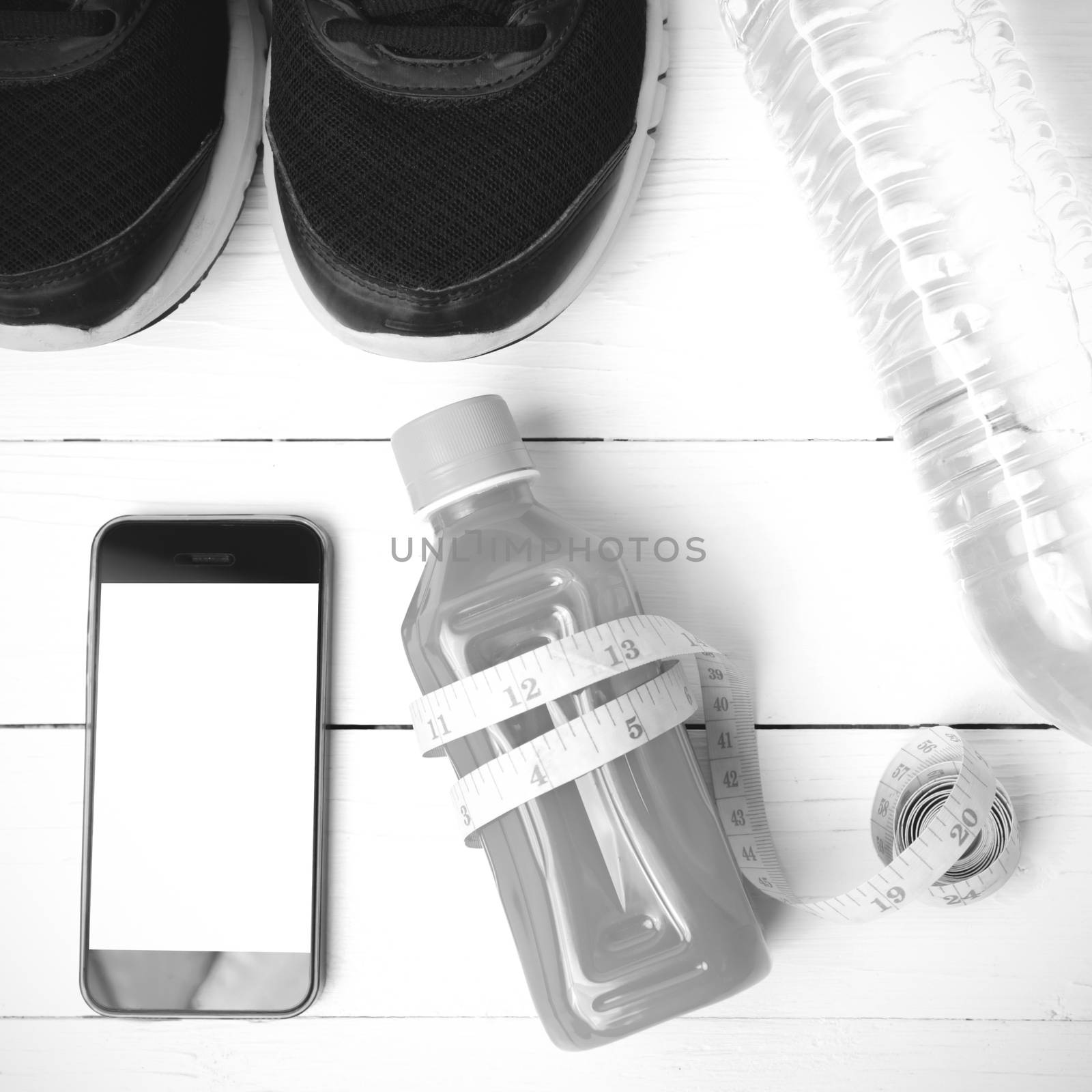 fitness equipment on white wood background black and white color by ammza12