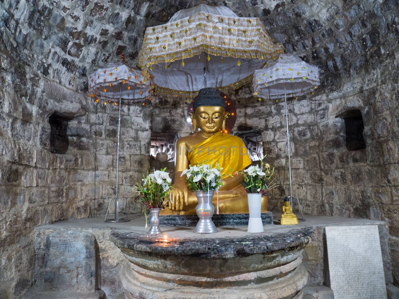 Golden Buddha image at the Htukkant Thein Temple in Mrauk-U, Rakhine State, Myanmar
