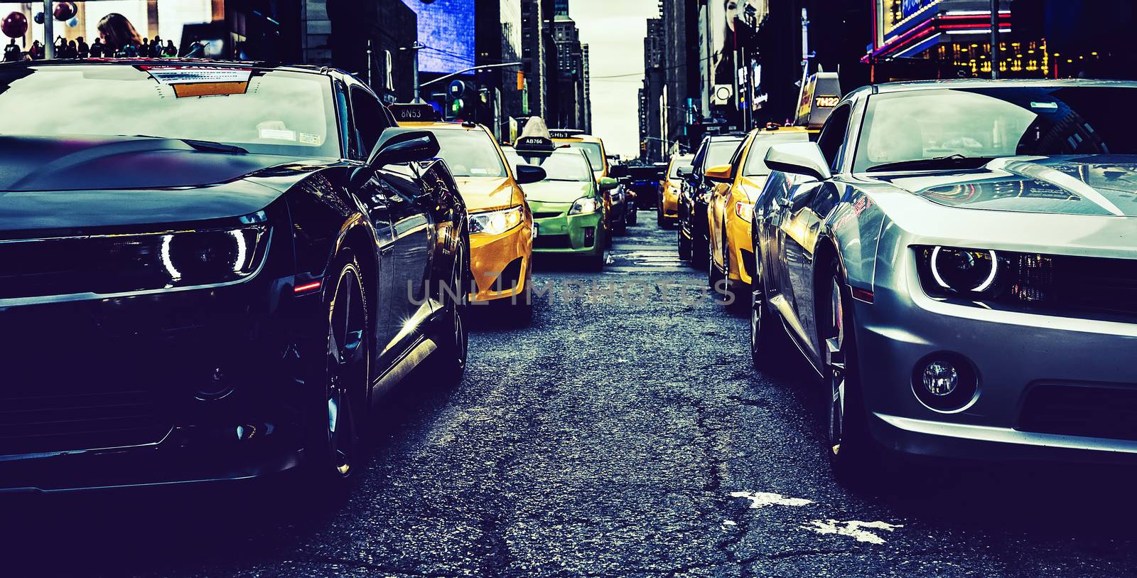 NEW YORK CITY - JULY 9: Cars on Times Square, an iconic street of New York City and America, July 9, 2015 in Manhattan, New York City. Special photographic processing