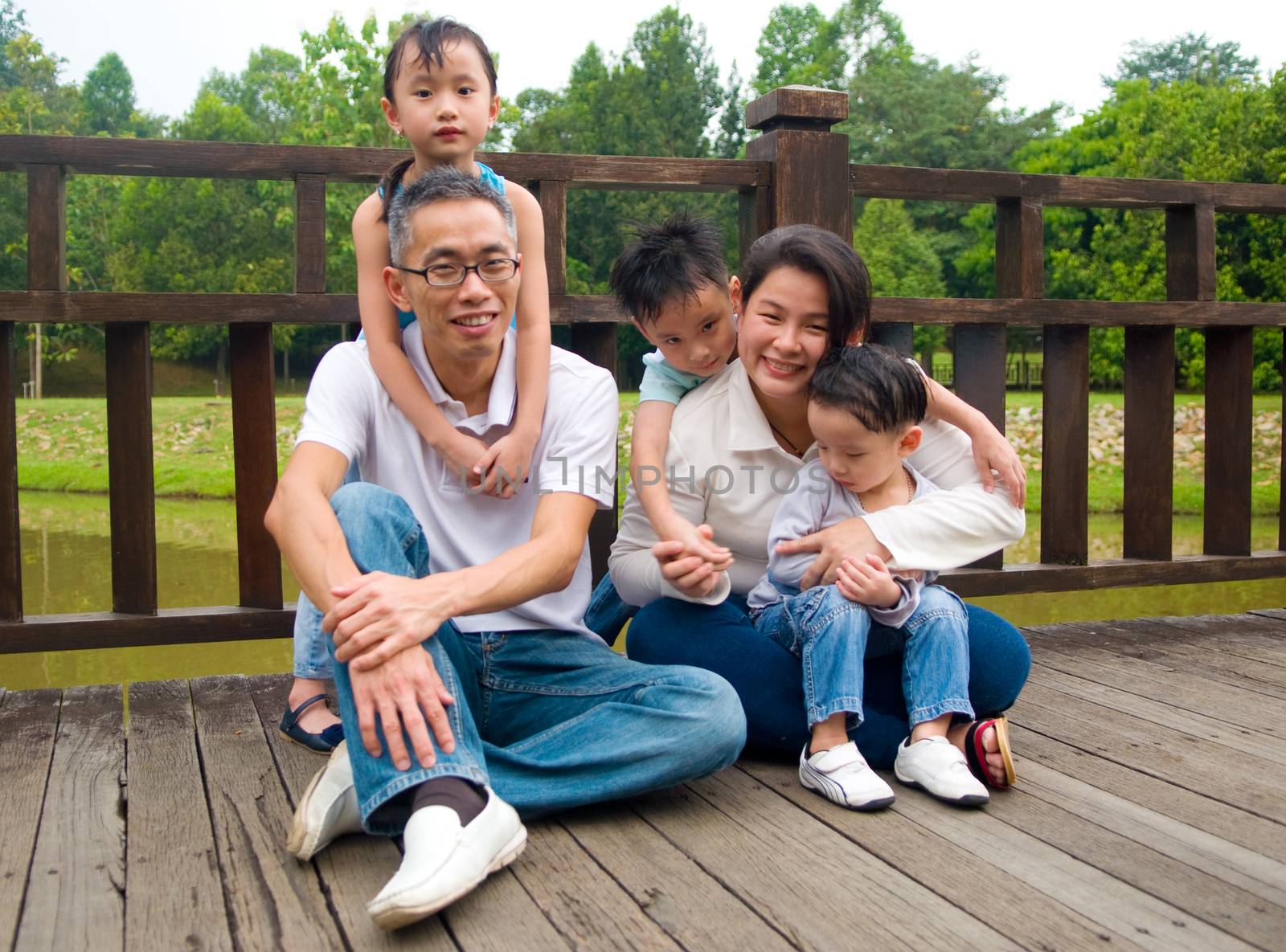 asian family having fun time at outdoor