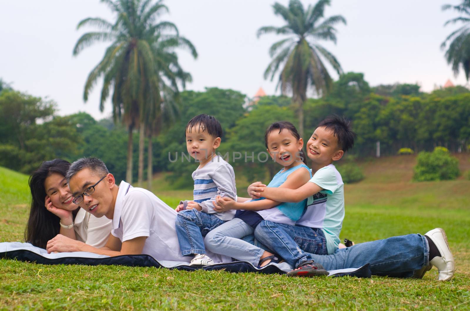 asian family having fun time at outdoor