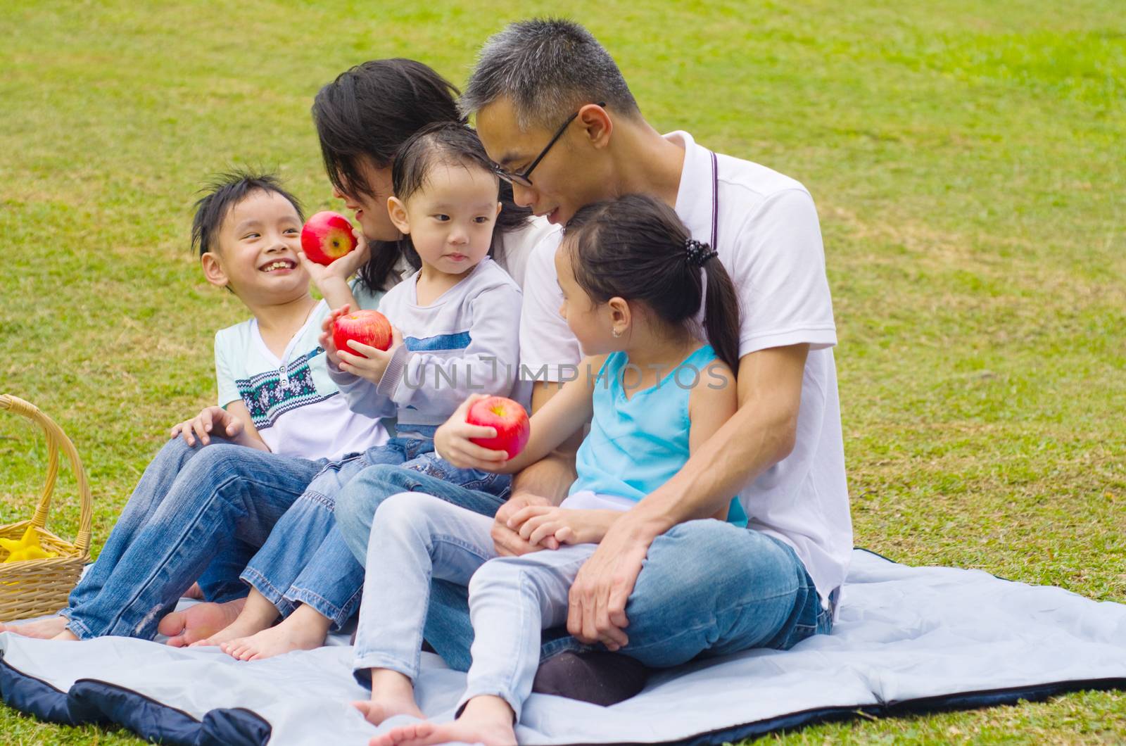 asian family having fun time at outdoor