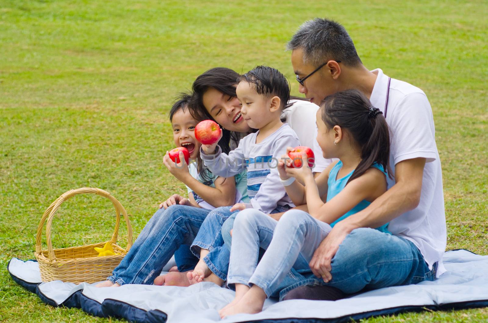 asian family having fun time at outdoor