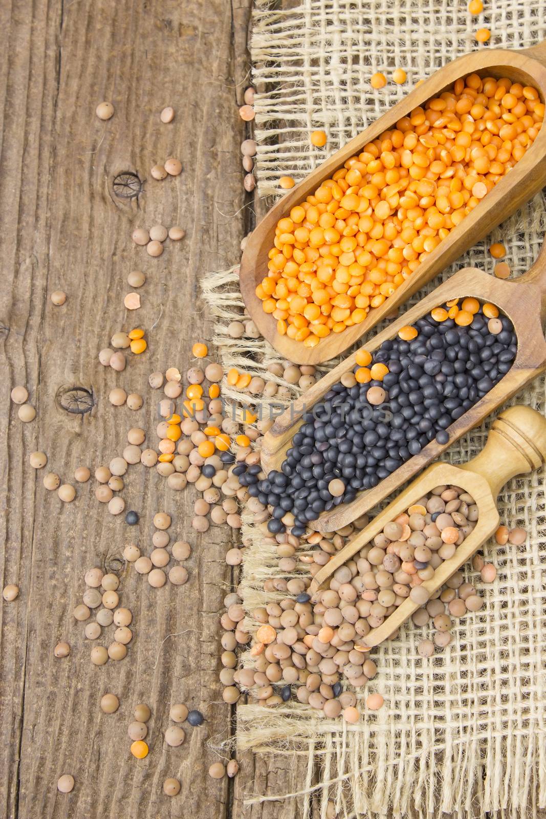 wooden scoops with lentils