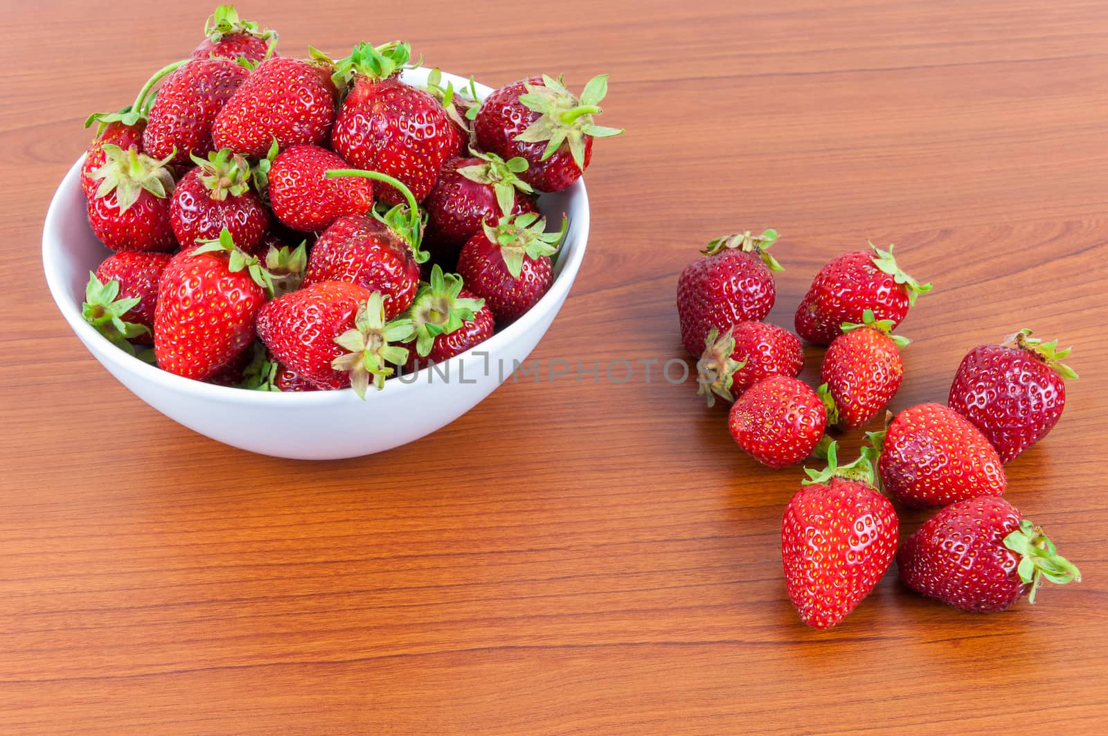 Bowl of strawberries by mkos83