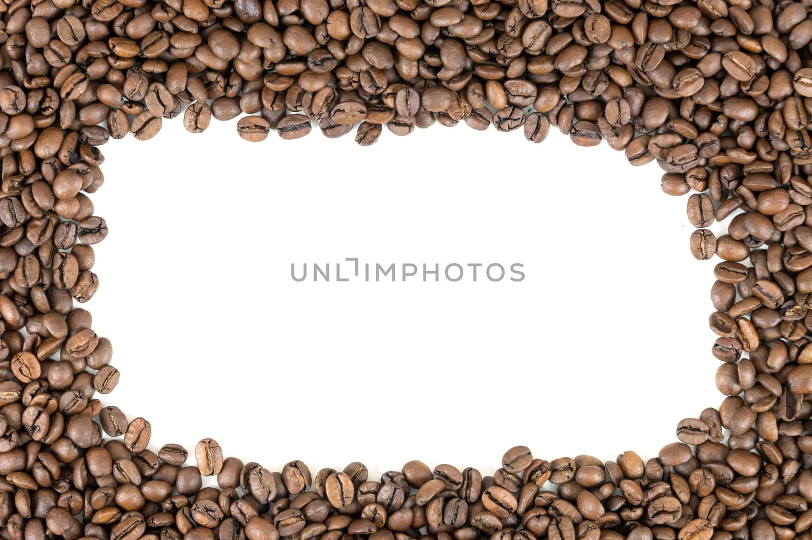 Frame made of coffee beans over white background 