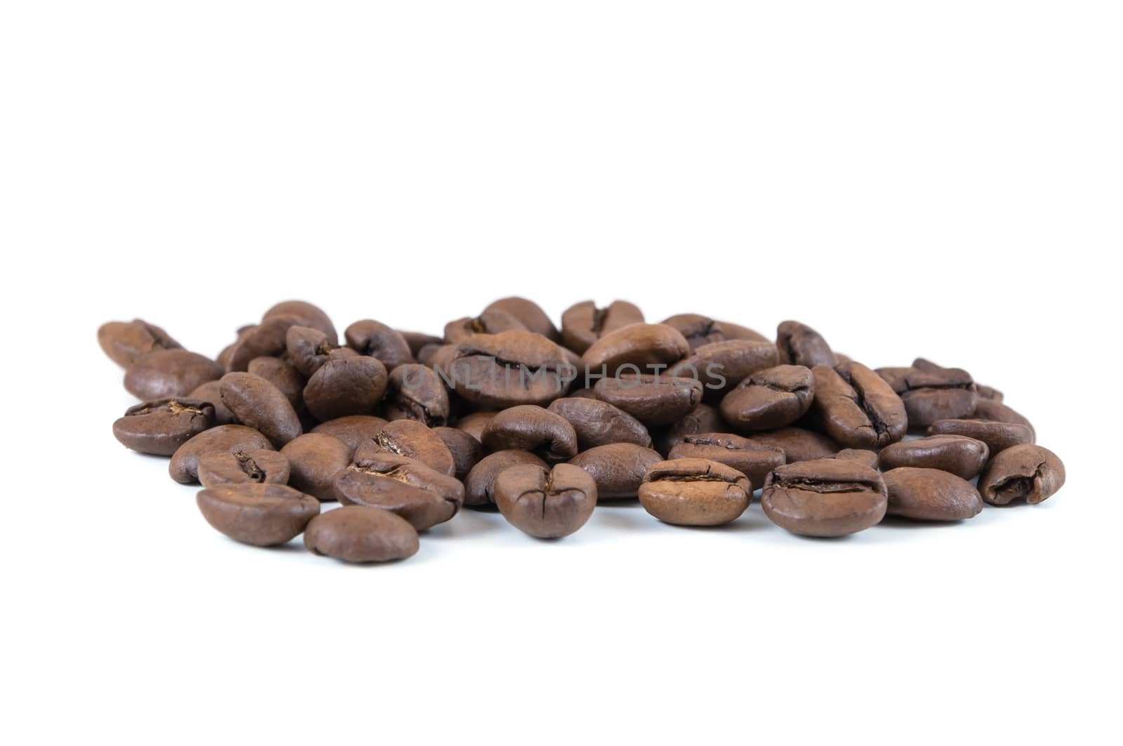 Closeup of coffee beans isolated on white background