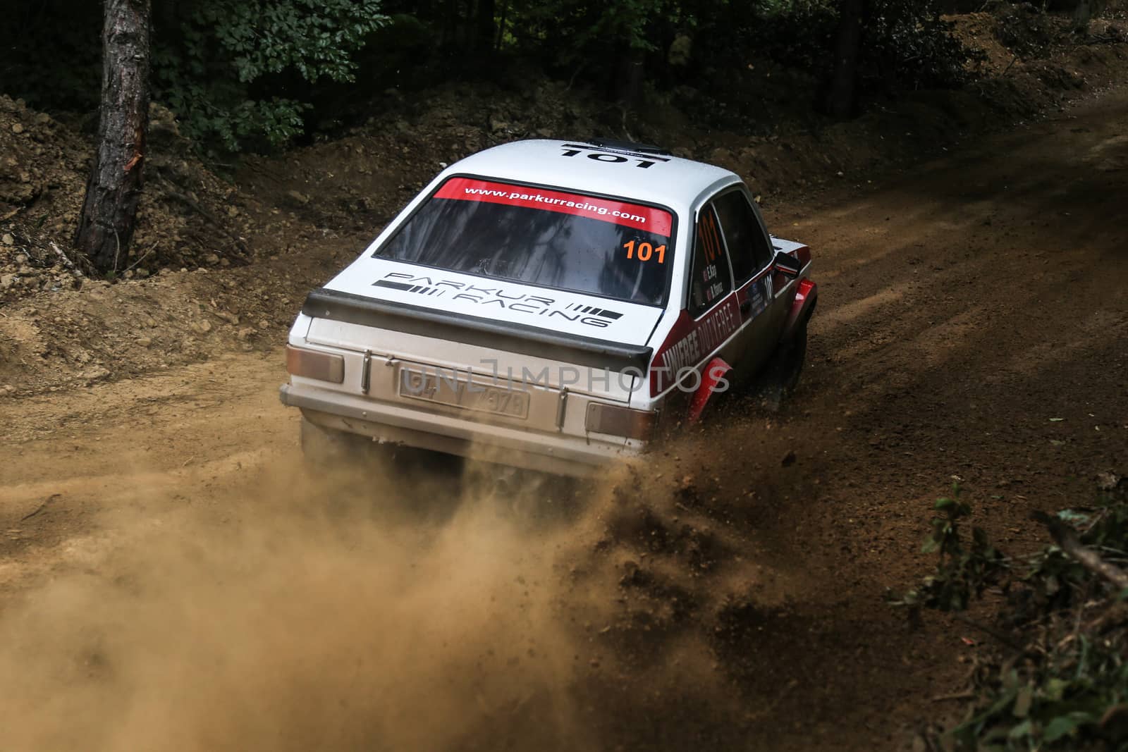 KOCAELI, TURKEY - AUGUST 23, 2015: Engin Kap with Ford Escort MK2 of Bonus Unifree Parkur Racing Team in Kocaeli Rally 2015