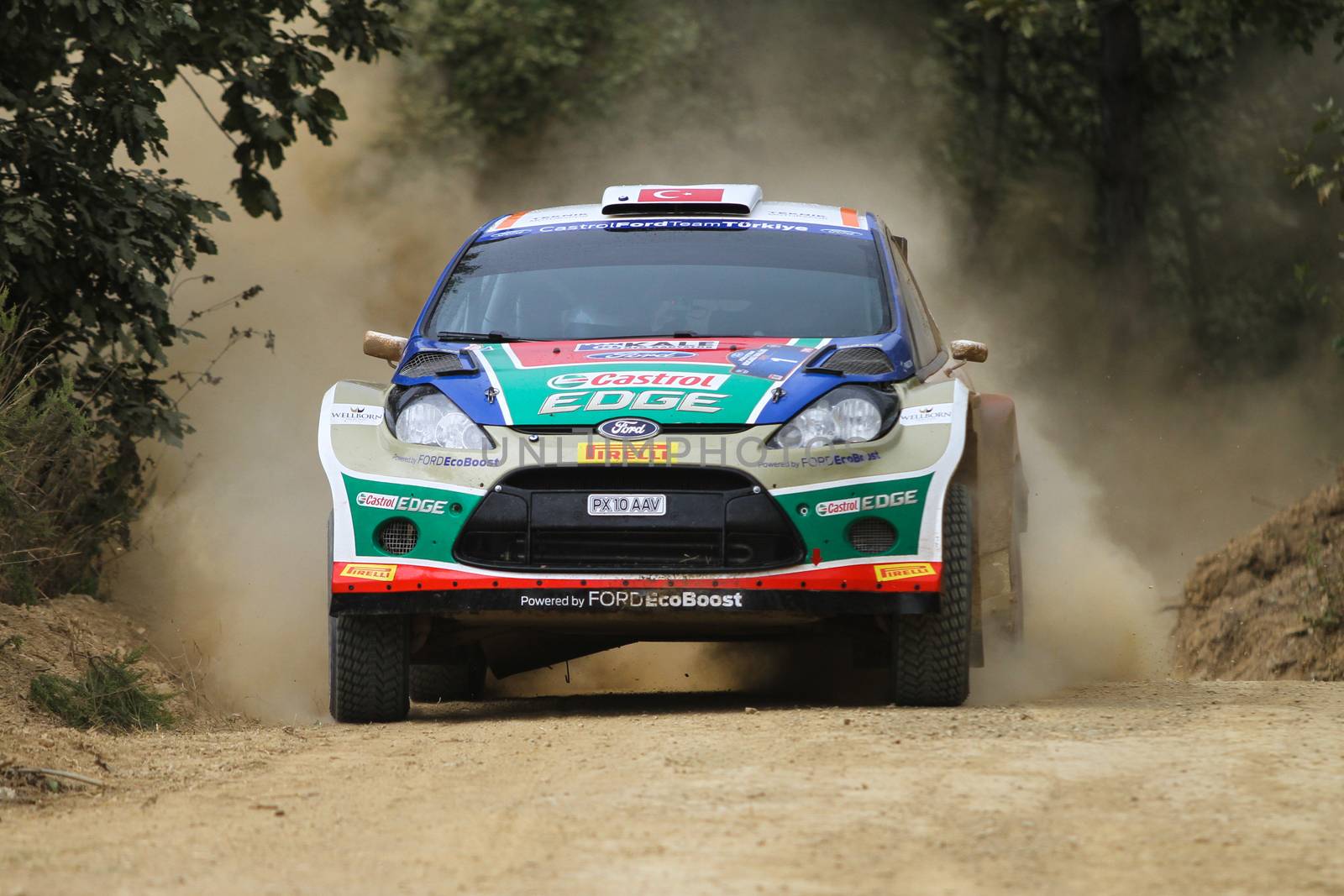 KOCAELI, TURKEY - AUGUST 22, 2015: Murat Bostanci with Ford Fiesta S2000 of Castrol Ford Team Turkiye in Kocaeli Rally 2015