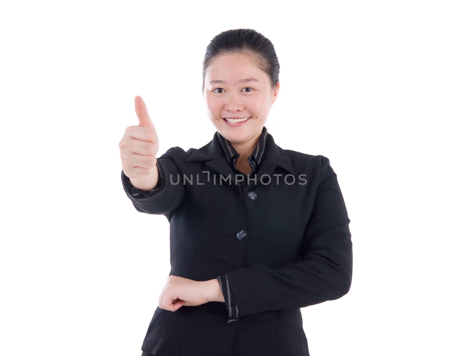 An Asian girl giving thumb up sign on white background