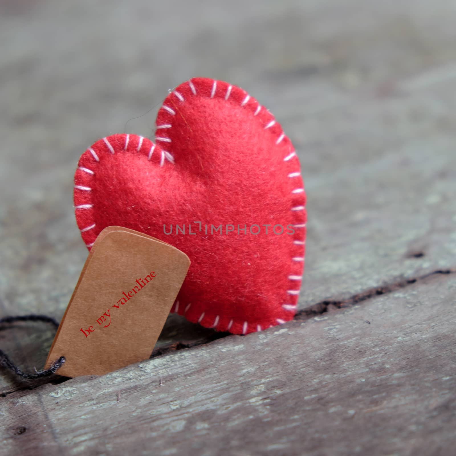 Red Valentine heart on wood background, one lonely heart in Valentine day, a special day for couple on feb 14, a abstract concept for love
