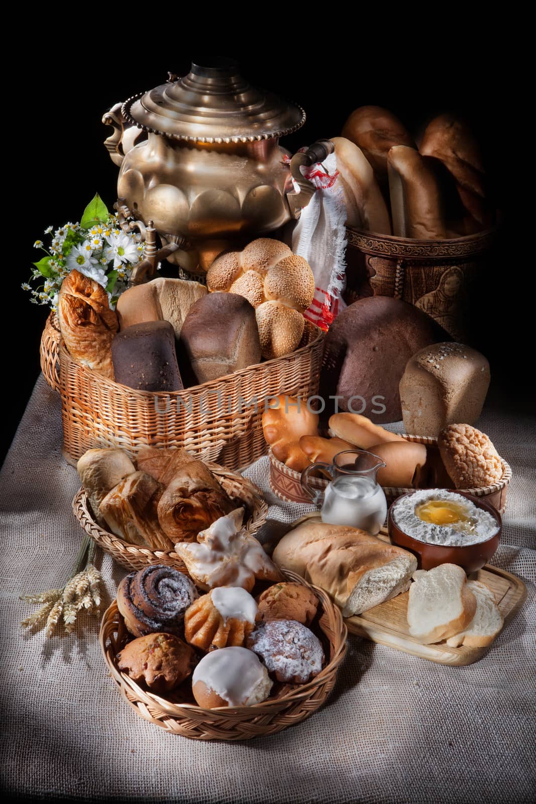 Different kinds of bread on a canvas studio background