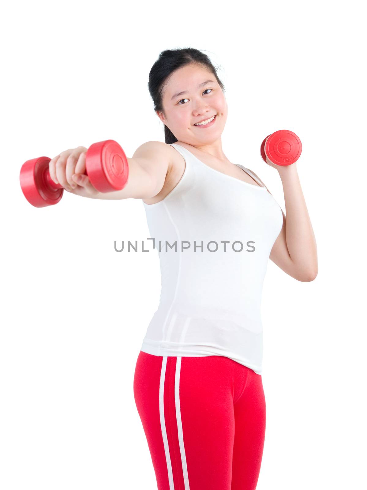 happy young woman exercising with dumbbells