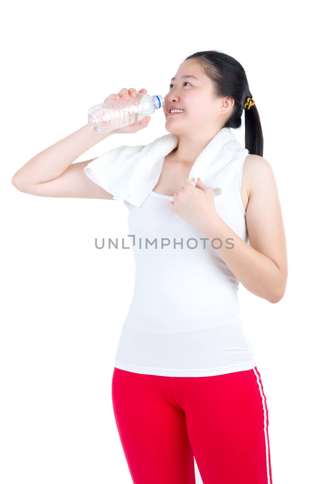 sport woman drinking water with towel