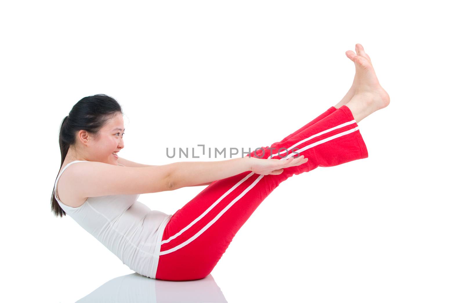 Woman doing abdominal crunches on exercise