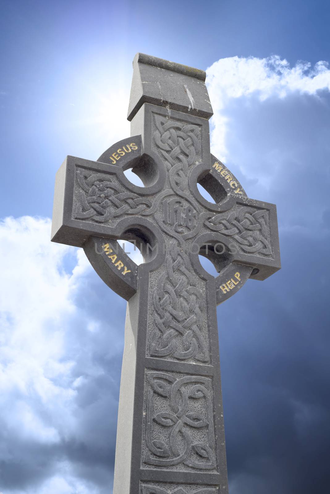 celtic cross head stone from a grave yard in ireland