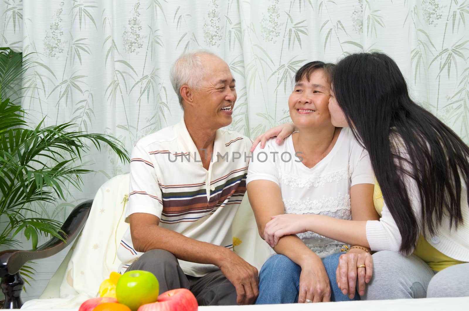 Indoor portrait of asian family