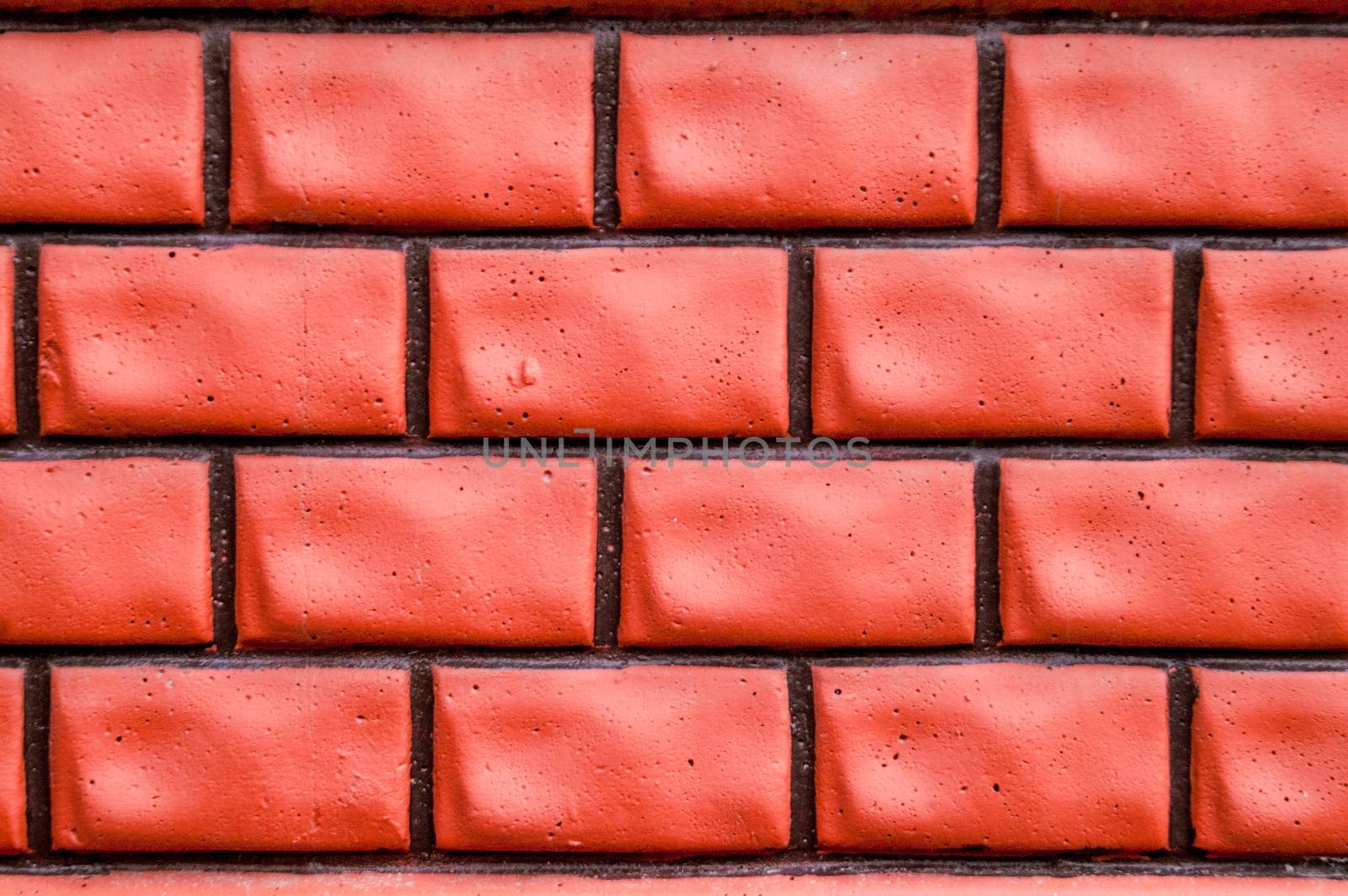 Brick background and wall from a red brick