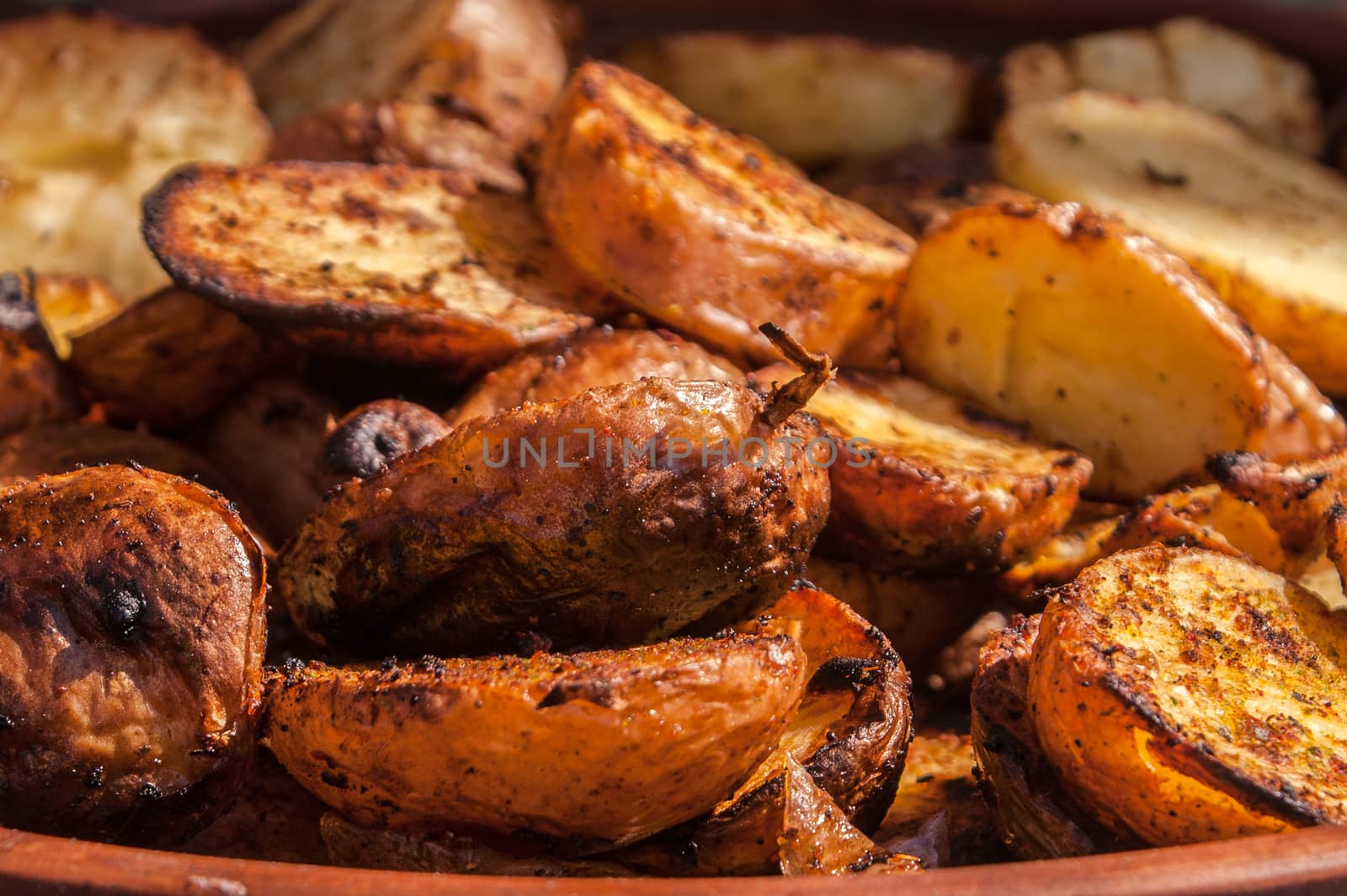 tasty karotofel slices of slices fried on a grill