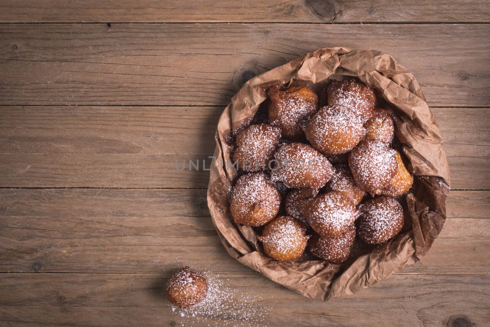 Fried carnival italian dessert in carnival top view composition