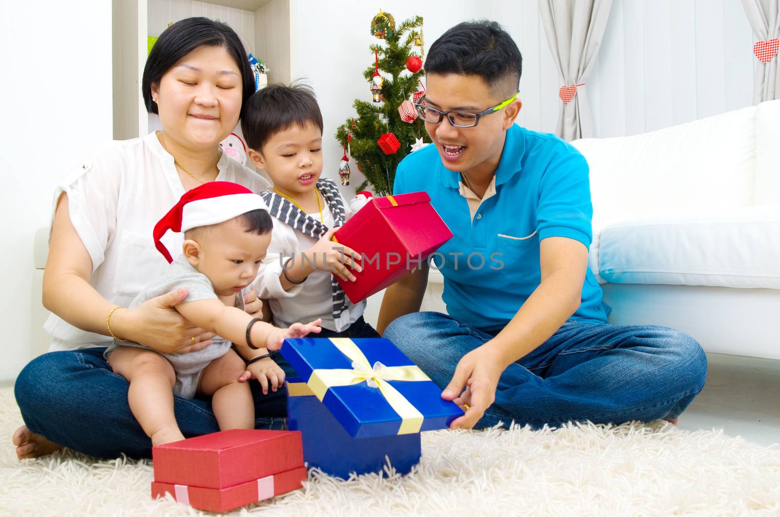 Portrait of happy family members on Christmas eve