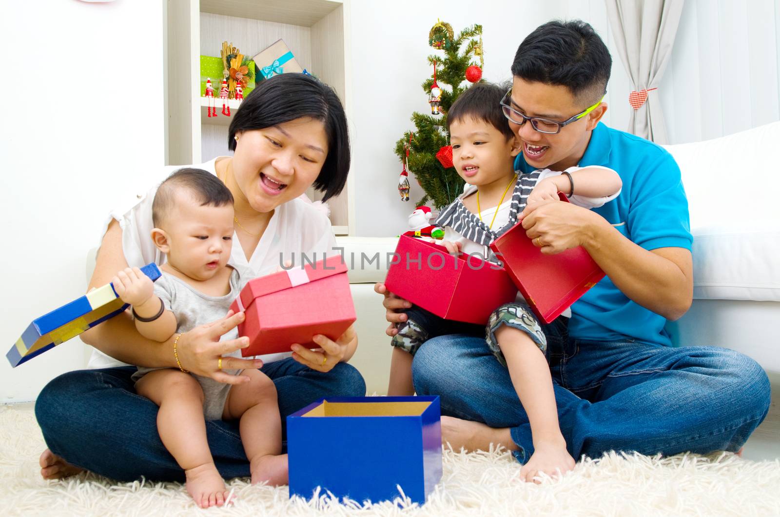 Portrait of happy family members on Christmas eve