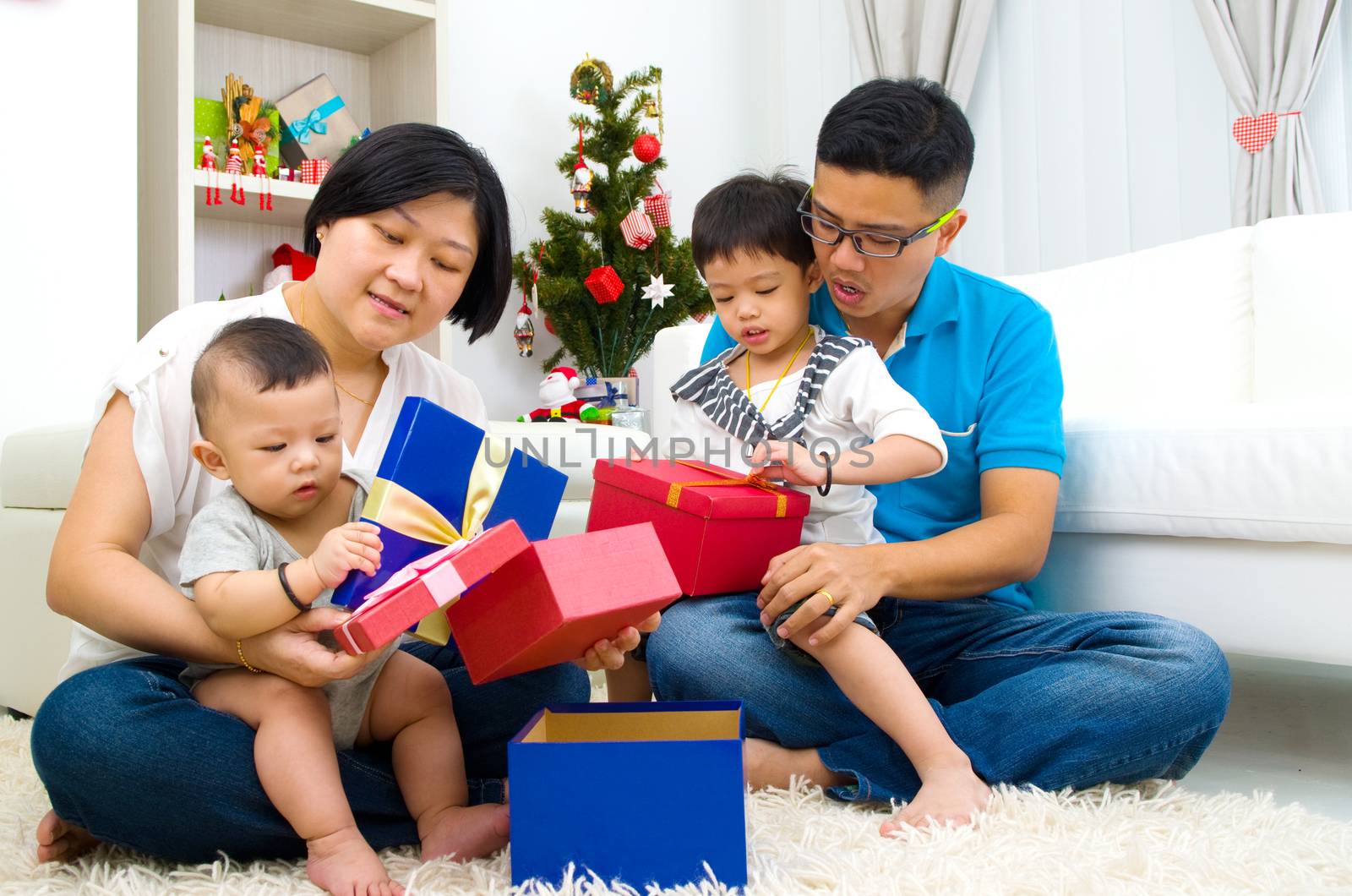 Portrait of happy family members on Christmas eve