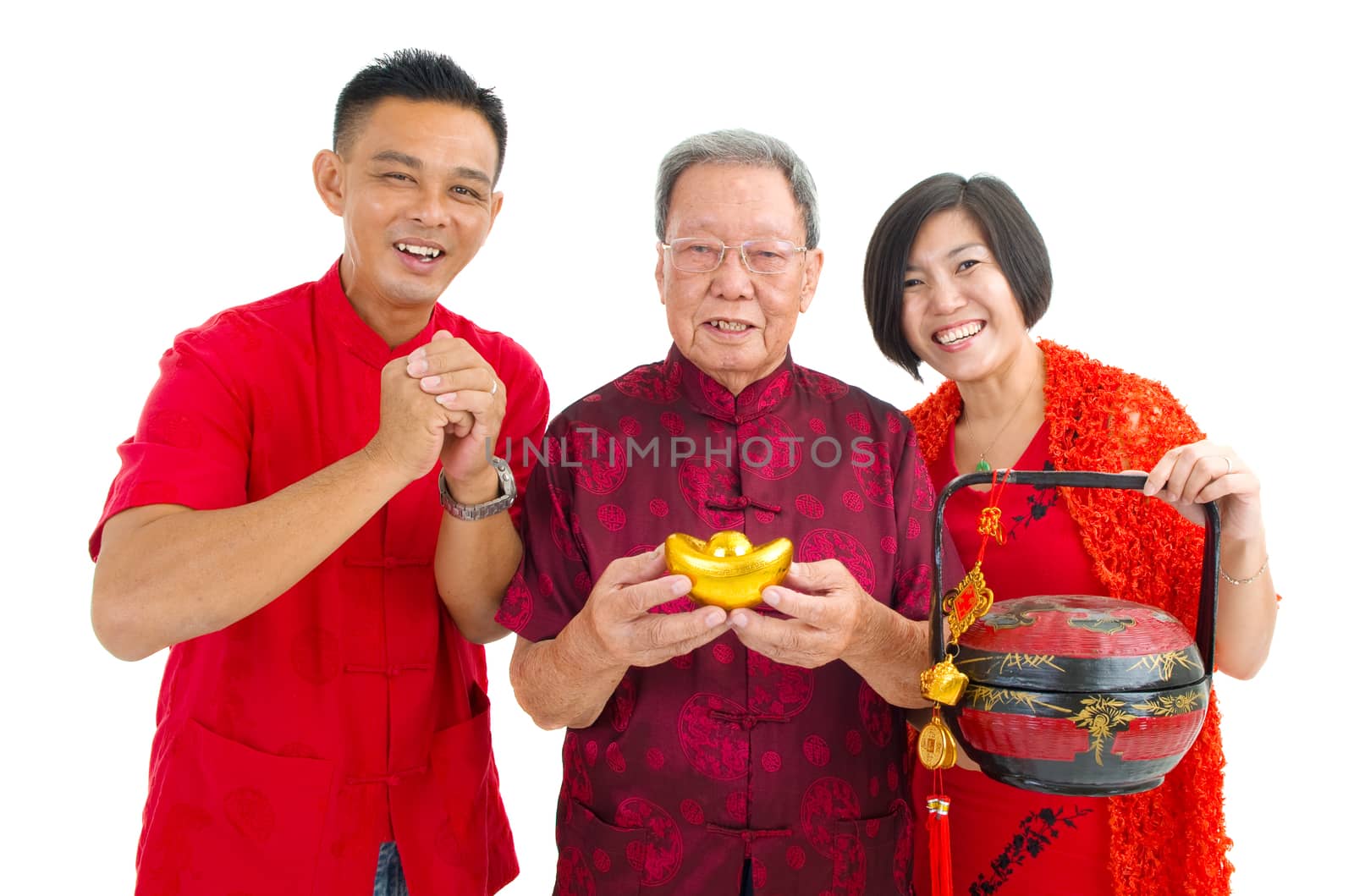 Asian senior man and children celebrating chinese new year