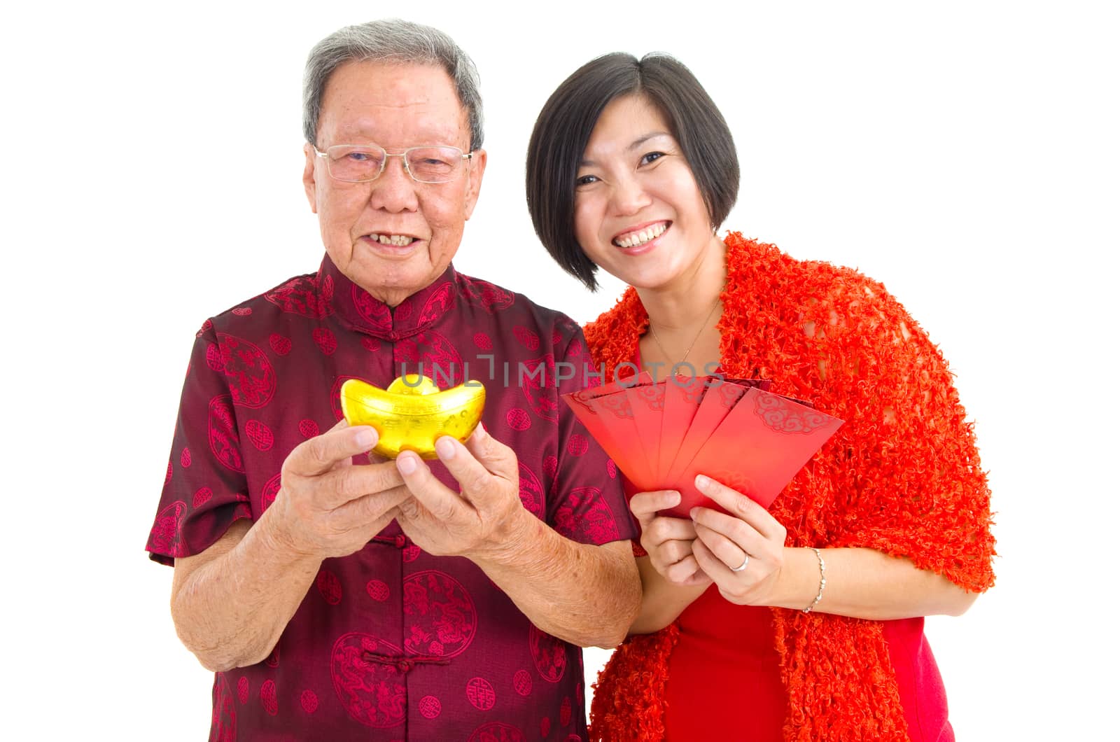 Asian senior man and his daughter celebrate chinese new year
