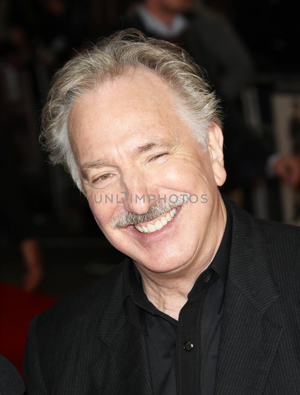 ENGLAND, London: Alan Rickman at the World Film Premiere of 'Gambit' at the Empire Cinema, Leicester Square on November 7, 2012.Rickman died after suffering from cancer, according to his family. He is best known for his roles in Die Hard, The Harry Potter series and Robin Hood. He was 69 years old.