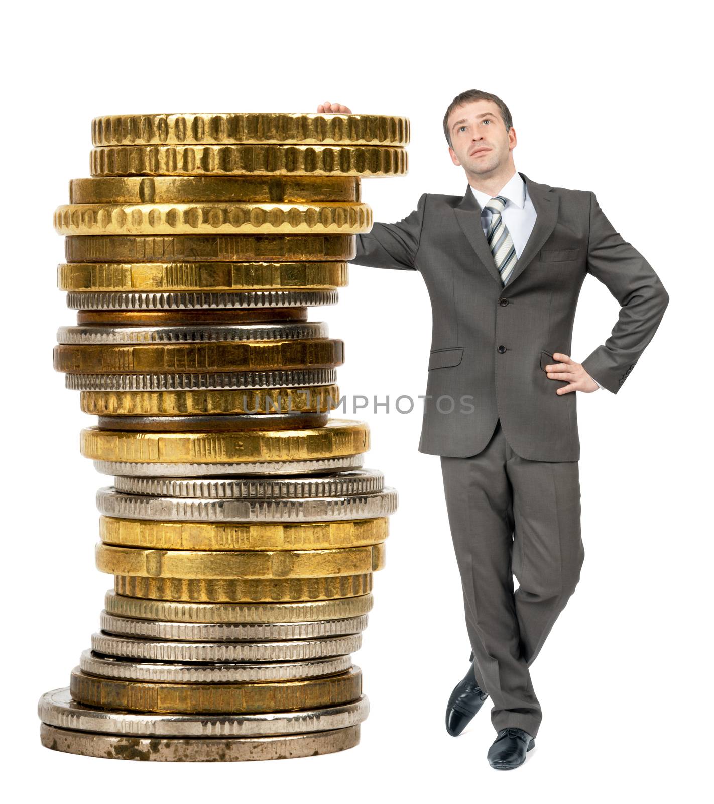 Businessman with big stack of coins isolated on white background, closeup