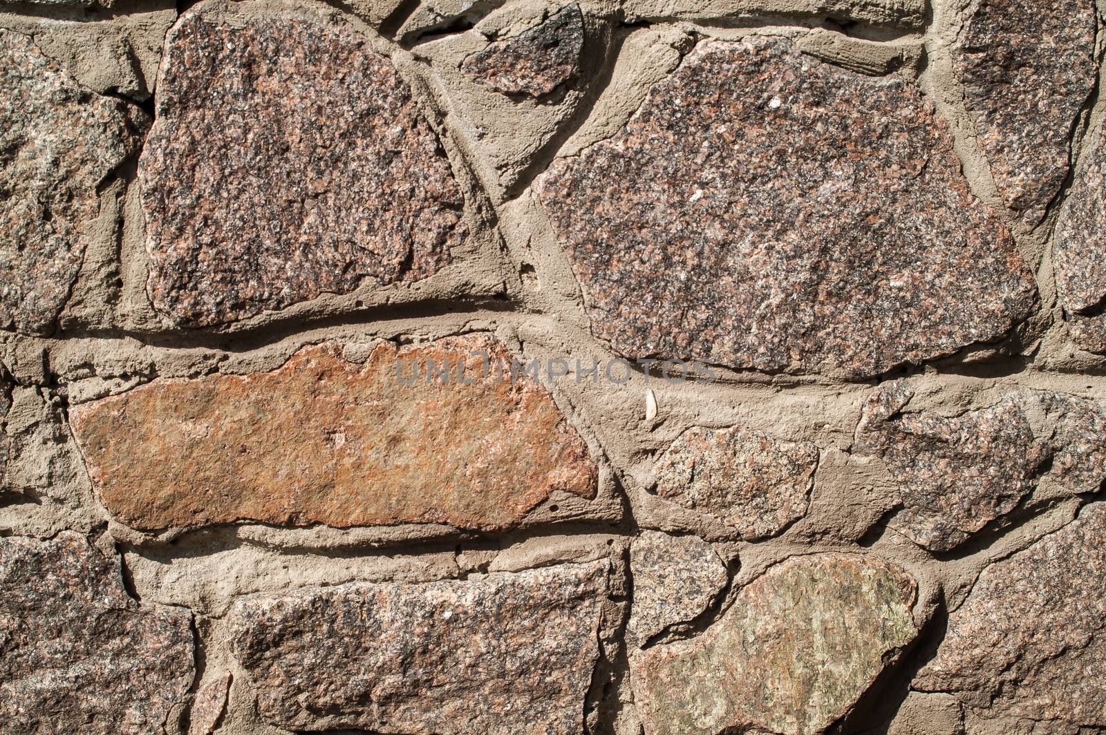 Stone wall beautiful bright sunny day, and stone