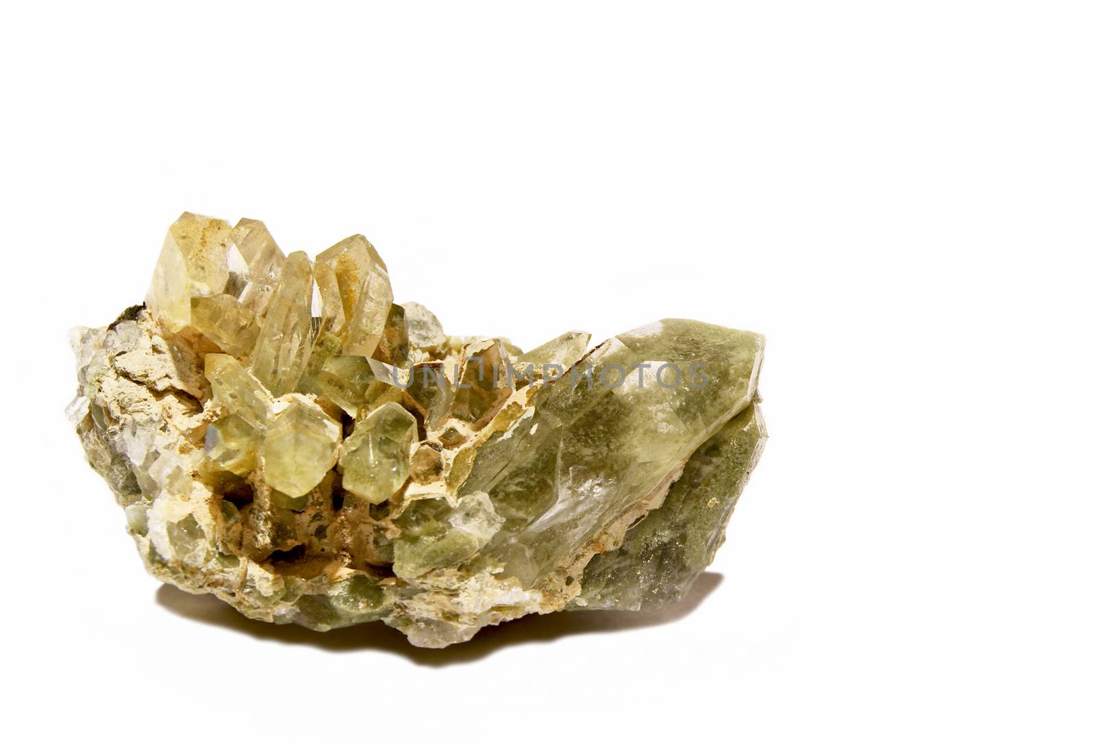 Cluster of natural green chlorite quartz crystals on white background