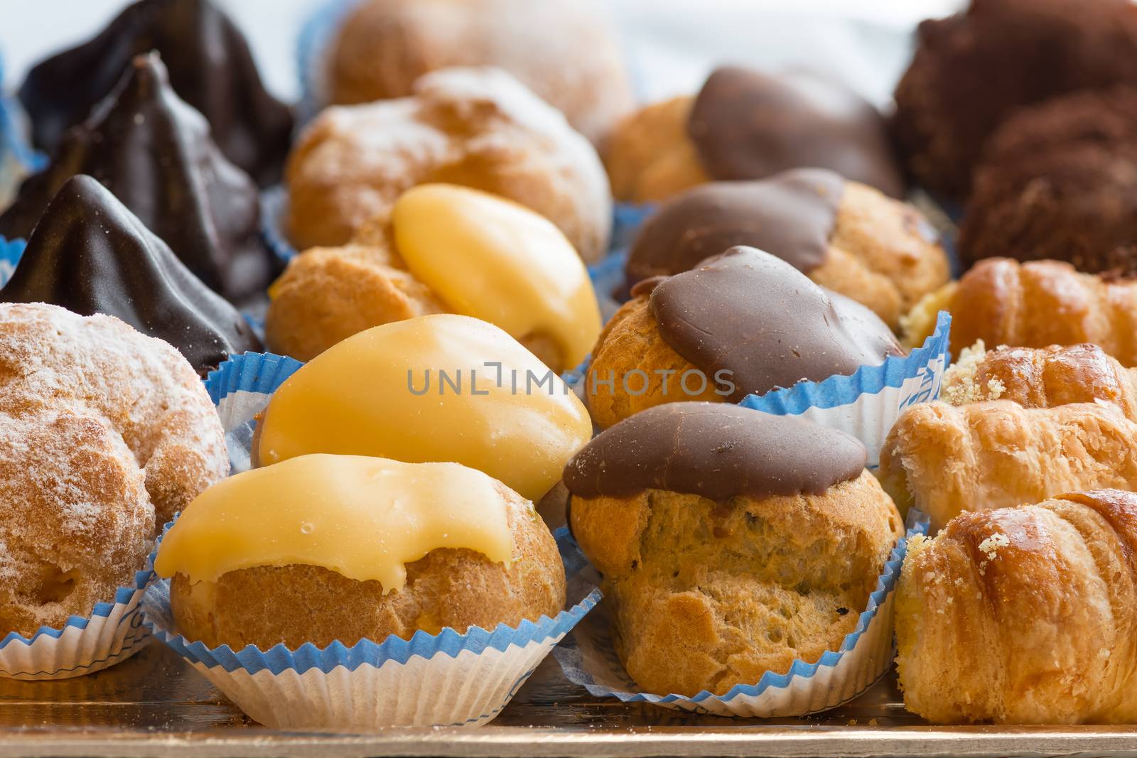 In the pictured colorful pastries with candied,cream and chocolate, the real Italian confectionery.