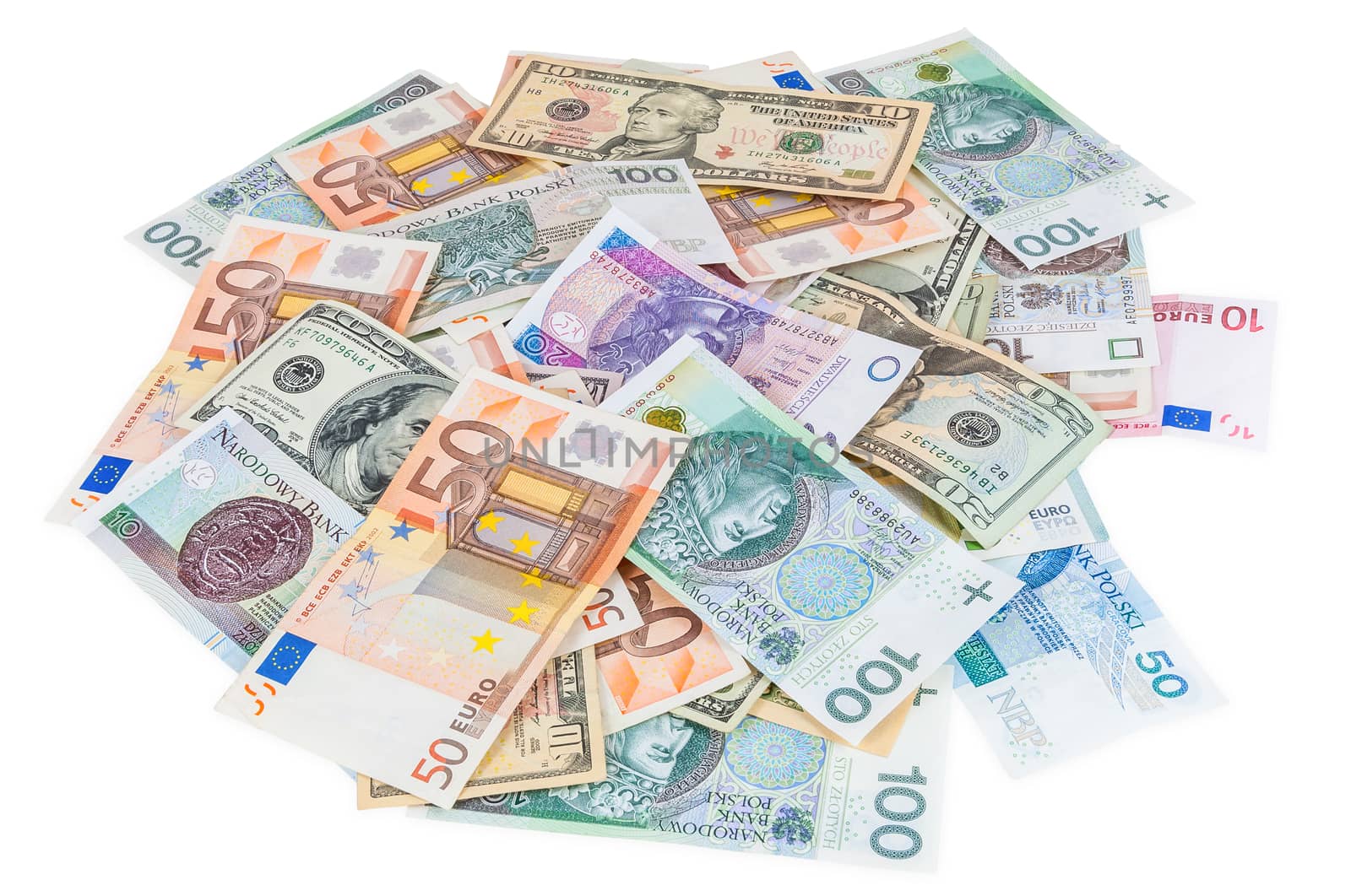 Heap of dollar, euro and polish zloty banknotes isolated on white background with clipping path