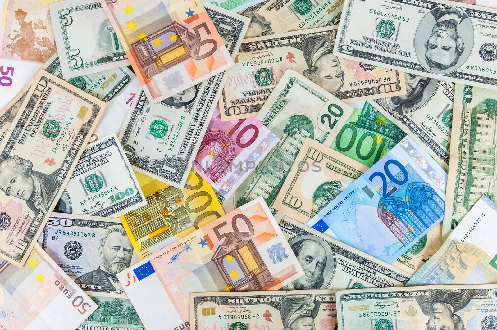 Background made of dollar and euro banknotes 