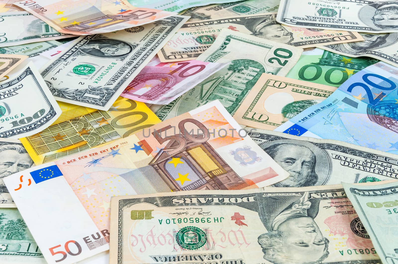 Background made of dollar and euro banknotes 