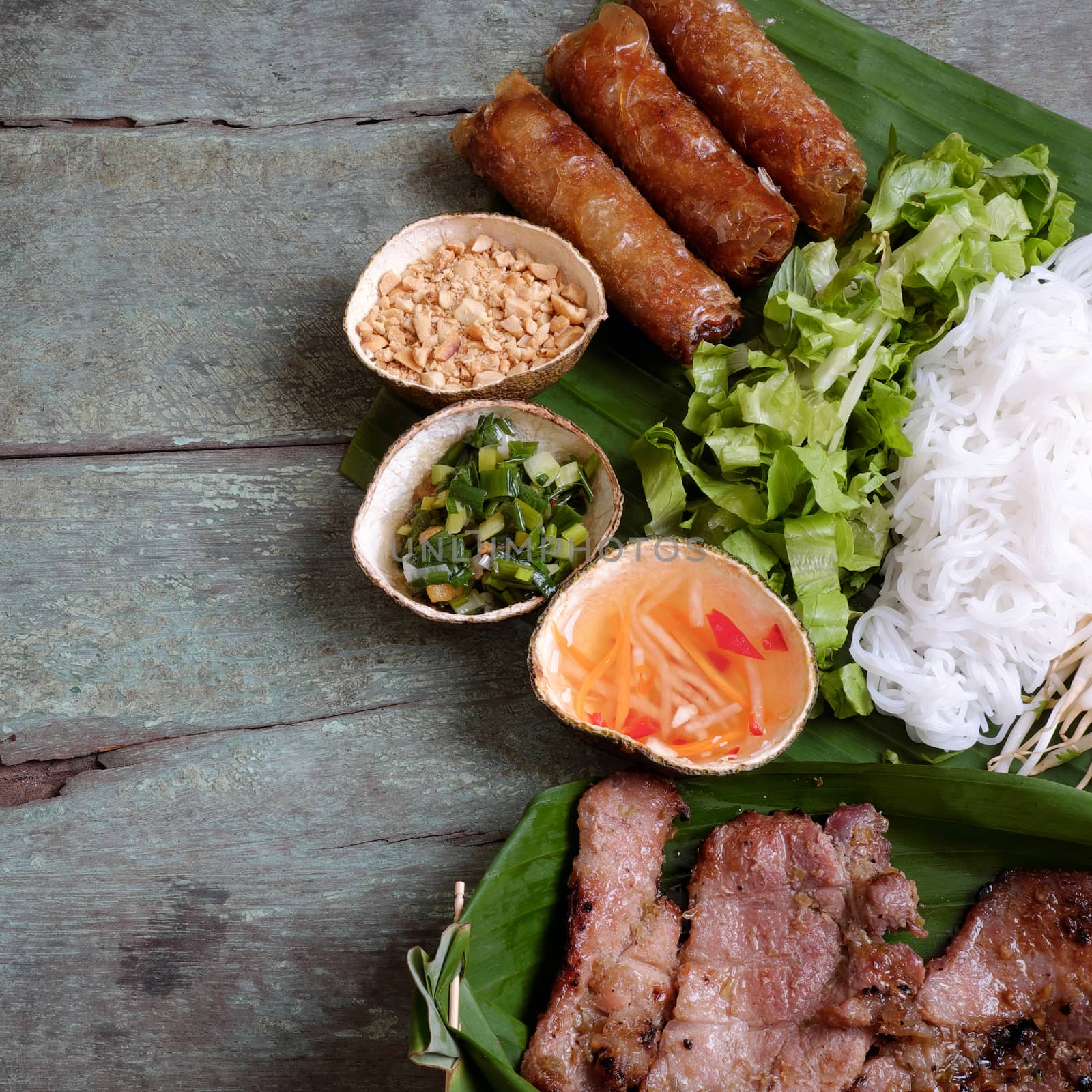 Vietnamese food, spring roll or cha gio, roast meat , a delicious fried food, eat with bun, salad and fish sauce, this also rich calories, cholesterol, fatty food, popular Vietnam eating