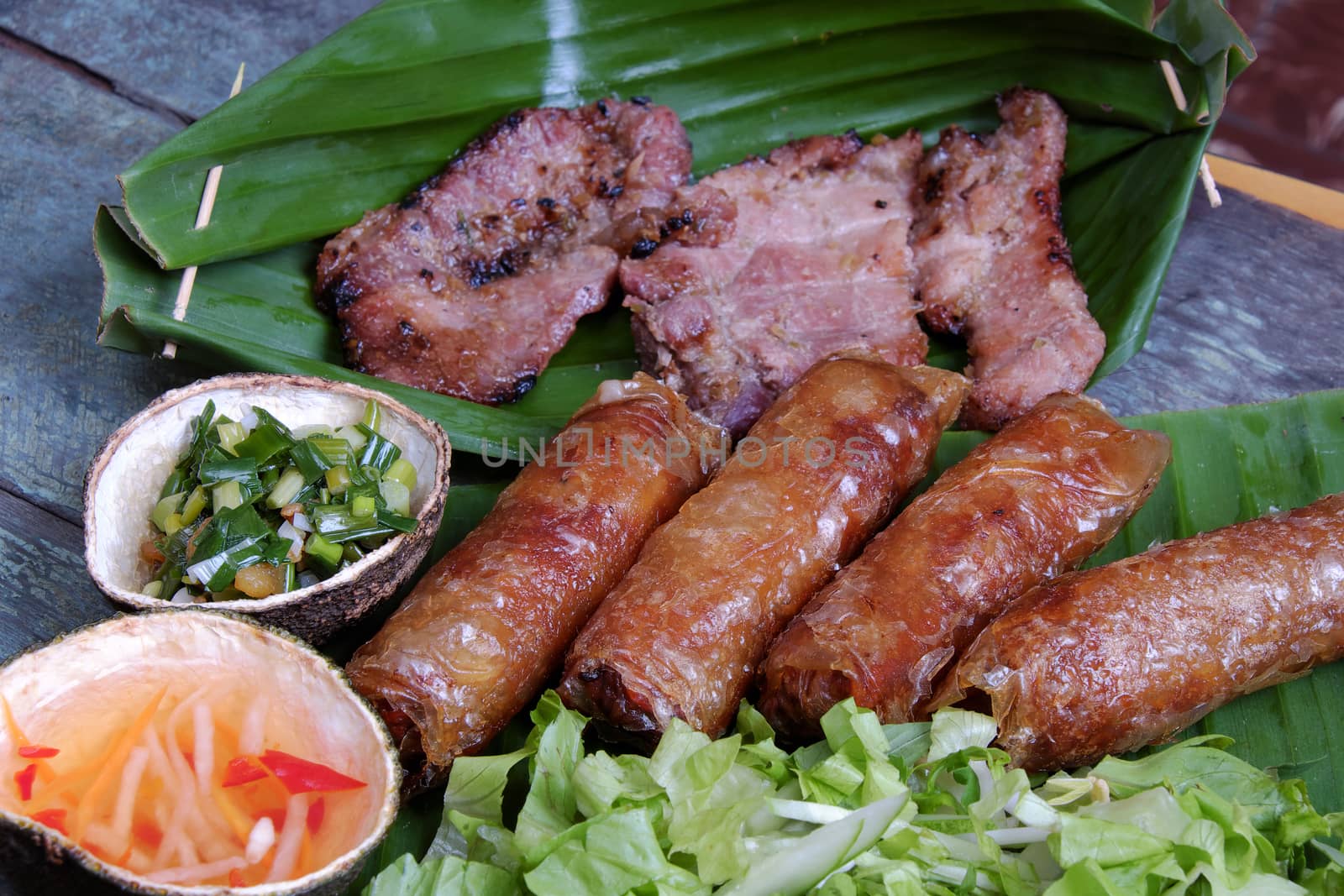 Vietnamese food, spring roll or cha gio, roast meat , a delicious fried food, eat with bun, salad and fish sauce, this also rich calories, cholesterol, fatty food, popular Vietnam eating