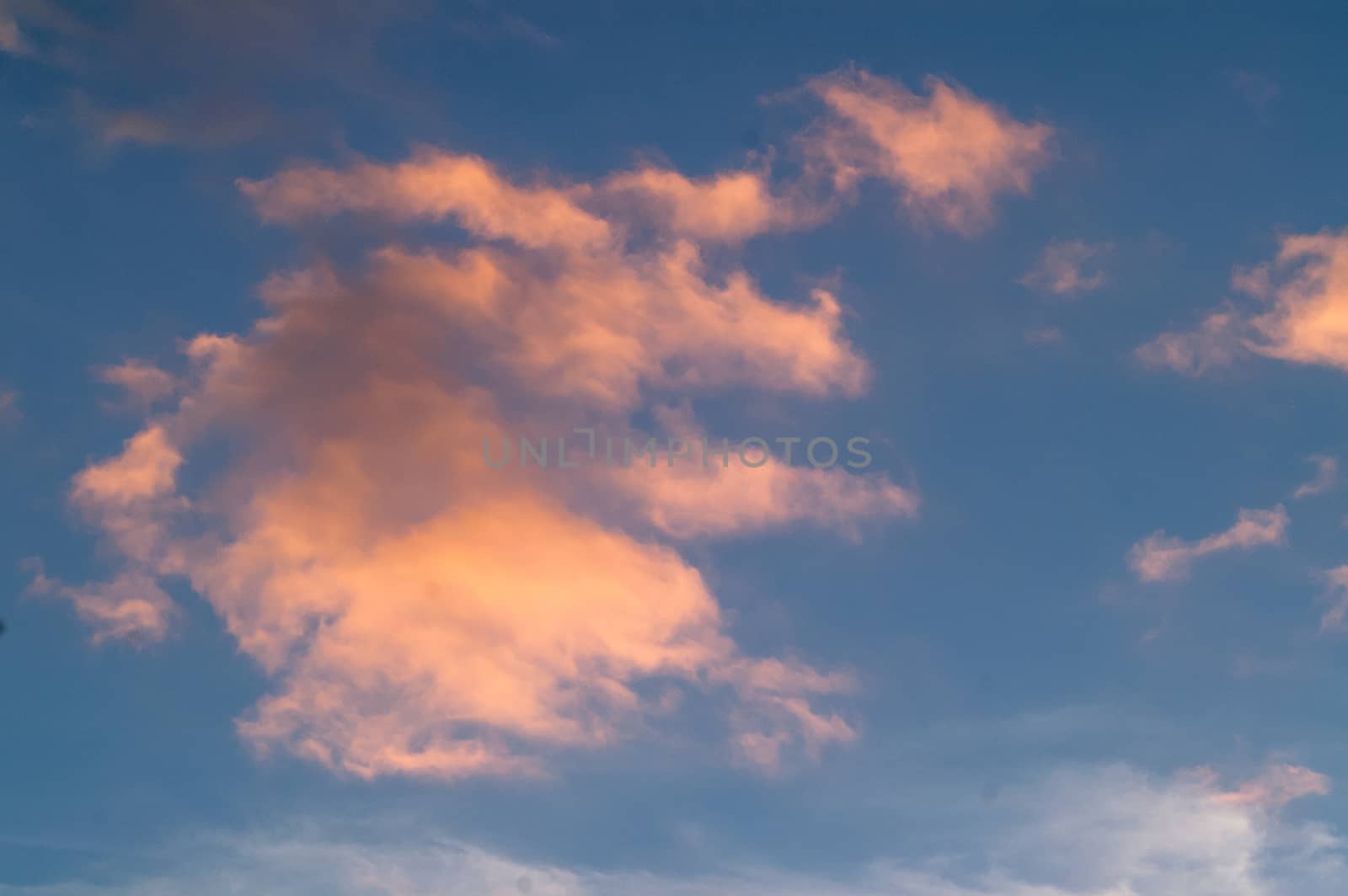 Autumn red gray clouds in the blue sky  by antonius_