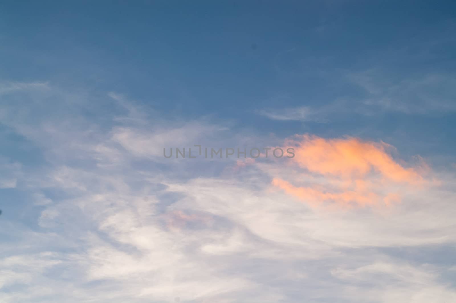 Autumn red gray clouds in the blue sky  by antonius_