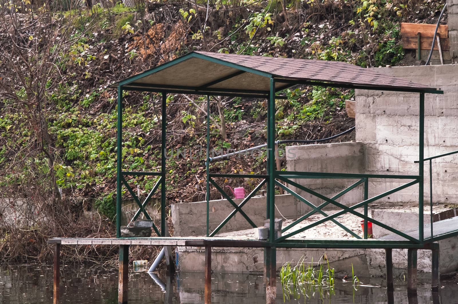 gazebo on the water for fishing and recreation by antonius_