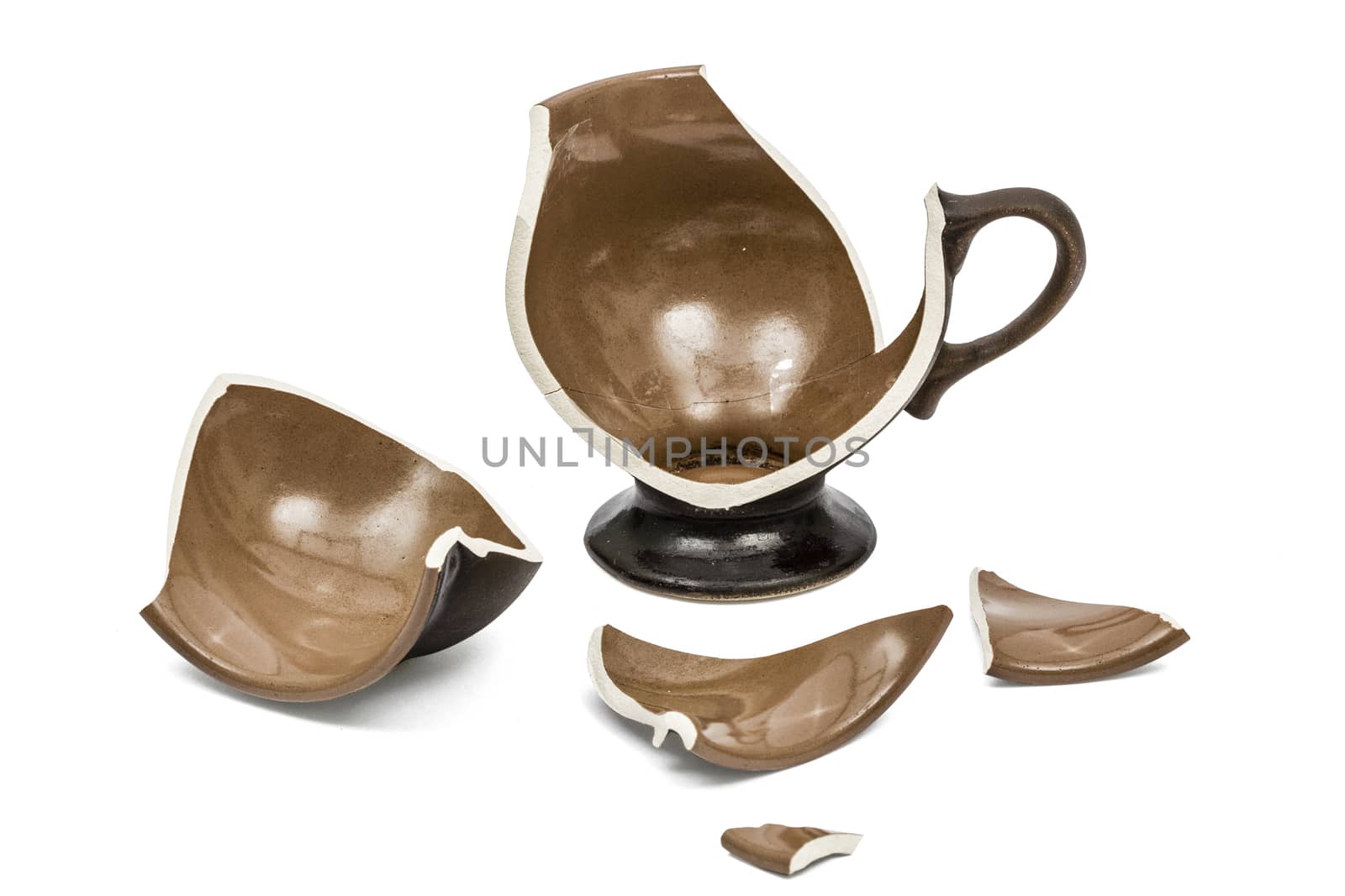Broken coffee cup, isolated on white background, with clipping path